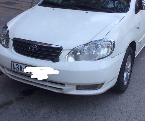 Bán Toyota Corolla Altis sản xuất năm 2002, màu trắng, nhập khẩu nguyên chiếc xe gia đình, 215 triệu0