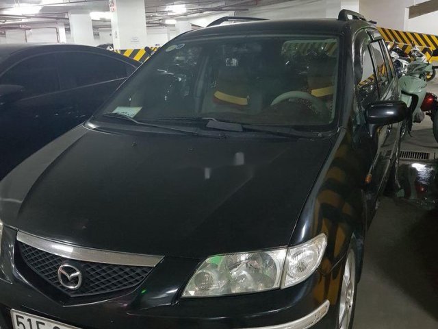 Cần bán Mazda Premacy đời 2003, màu đen chính chủ, 165tr