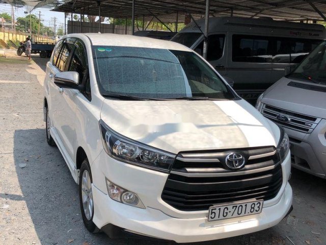 Bán xe Toyota Innova 2.0 E năm 2018, màu trắng mới chạy 22.000km giá cạnh tranh