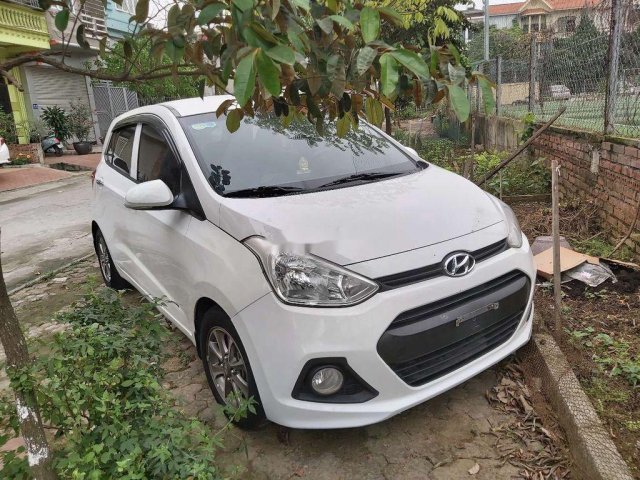 Bán ô tô Hyundai Grand i10 sản xuất 2014, màu trắng, nhập khẩu nguyên chiếc0