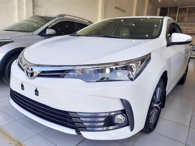 Cần bán gấp Toyota Corolla Altis 1.8G 2018, màu trắng, giá chỉ 705 triệu0