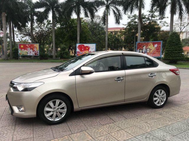 Cần bán Toyota Vios năm 2014, màu vàng giá cạnh tranh0