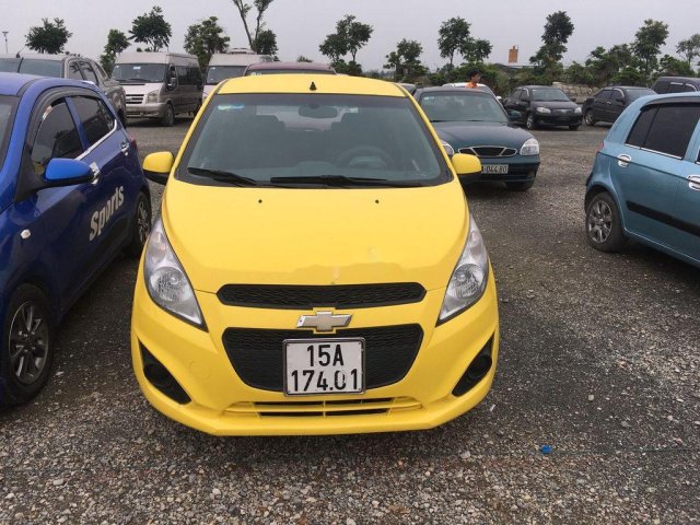 Bán Chevrolet Spark đời 2015, màu vàng, số sàn, giá chỉ 169 triệu