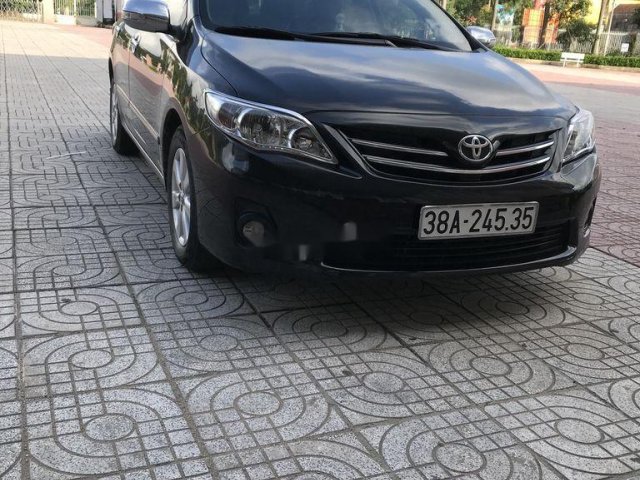 Cần bán Toyota Corolla Altis năm 2011, màu đen 0