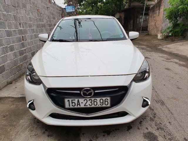 Bán xe Mazda 2 đời 2016, màu trắng số tự động, 425 triệu