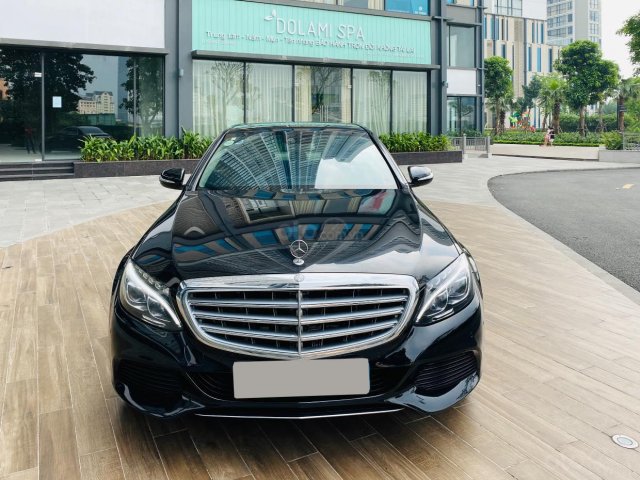 Xe chính chủ bán Mercedes C250 Exclusive sx 2015 màu đen nội thất đen sang trọng lịch lãm