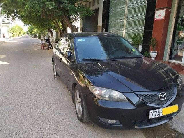 Gia đình bán Mazda 3 đời 2005, màu đen, nhập khẩu0