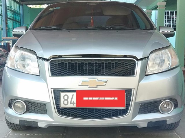 Cần bán xe Chevrolet Aveo 2016, màu bạc0