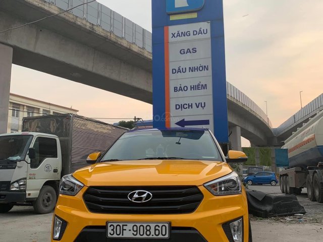 Bán xe Hyundai Creta đăng ký 2015, màu vàng mới 95% giá chỉ 585 triệu đồng