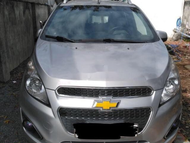 Cần bán lại xe Chevrolet Spark LT sản xuất năm 2014, màu bạc
