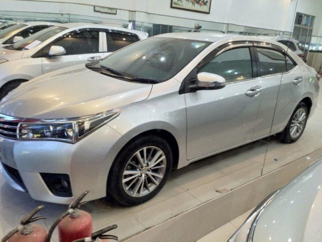 Bán Toyota Corolla Altis 1.8G AT đời 2016, màu bạc như mới
