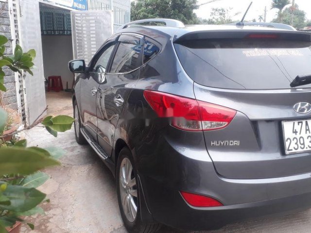 Cần bán gấp Hyundai Tucson đời 2012, màu xám, nhập khẩu nguyên chiếc đã đi 110000 km, 520 triệu