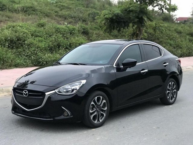 Bán Mazda 2 2017, màu đen số tự động, 440 triệu