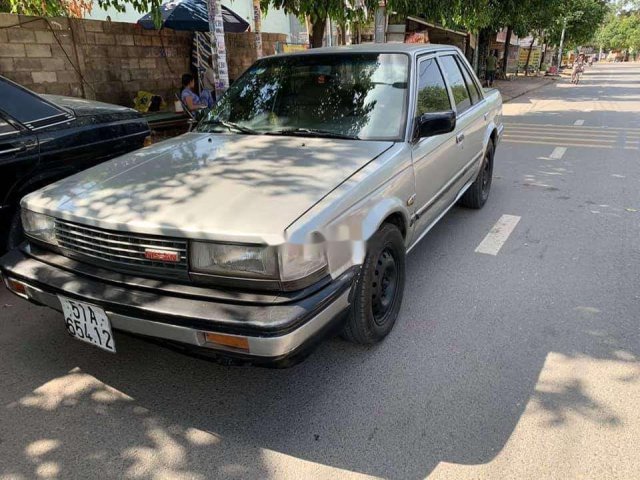 Cần bán Nissan Bluebird 1998, màu bạc, xe nhập0