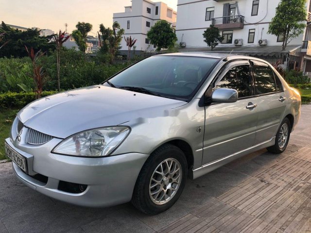 Bán xe Mitsubishi Lancer đời 2004, màu bạc