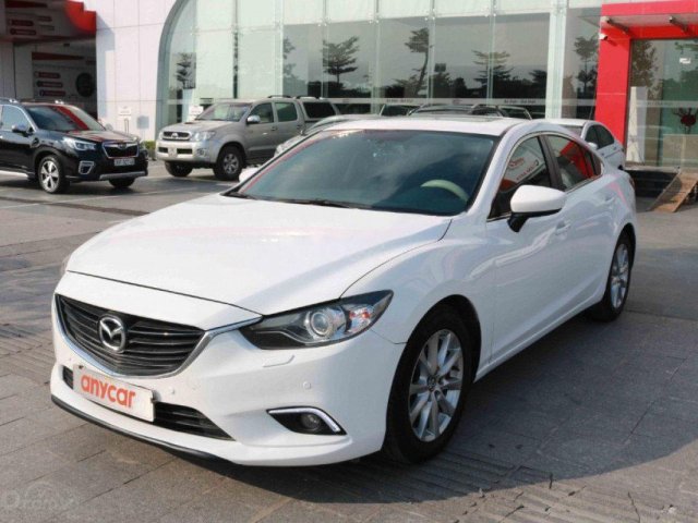 Cần bán gấp Mazda 6 2.0 AT đời 2015, màu trắng còn mới, 629tr