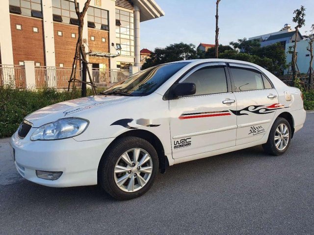 Cần bán xe Toyota Corolla Altis 1.8 năm 2002, màu trắng chính chủ