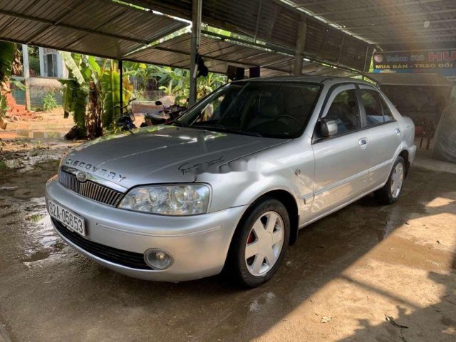 Bán xe Ford Laser sản xuất 2002, màu bạc xe gia đình