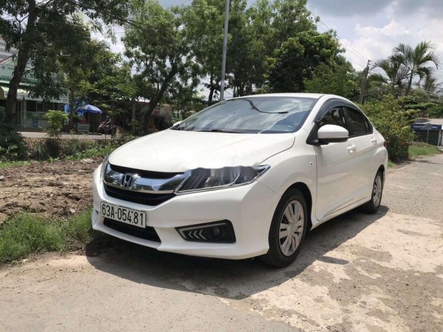 Cần bán lại xe Honda City 1.5 MT năm 2016, màu trắng số sàn, giá tốt0