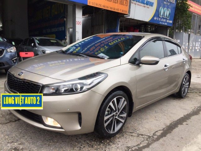 Bán xe Kia Cerato 2.0 AT sản xuất năm 2016, màu vàng, chính chủ 0