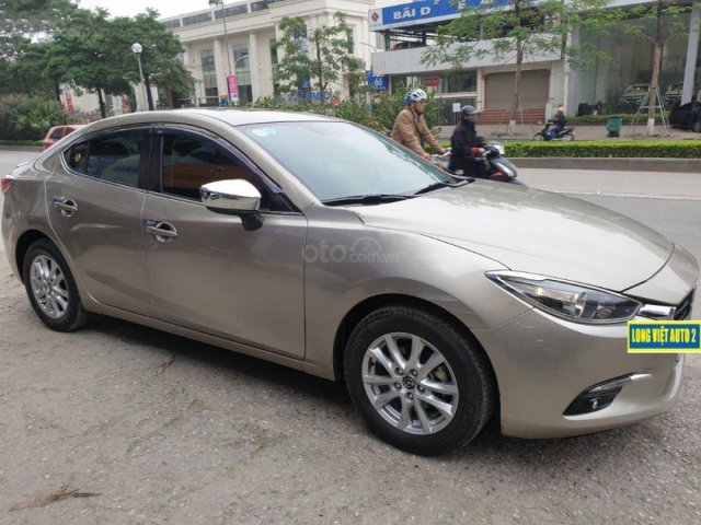 Cần bán Mazda 3 1.5 AT năm sản xuất 2018, màu vàng cát0