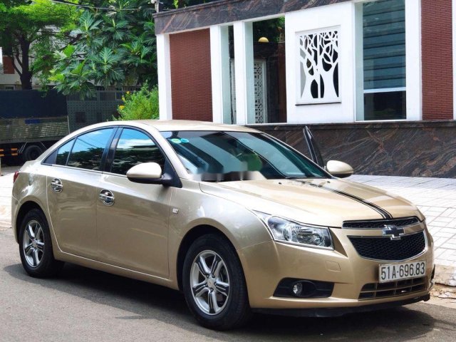 Cần bán xe Chevrolet Cruze LTZ AT đời 2014, màu vàng xe gia đình, giá chỉ 328 triệu