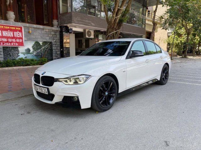 Bán xe BMW 330i đời 2015, màu trắng, nhập khẩu0