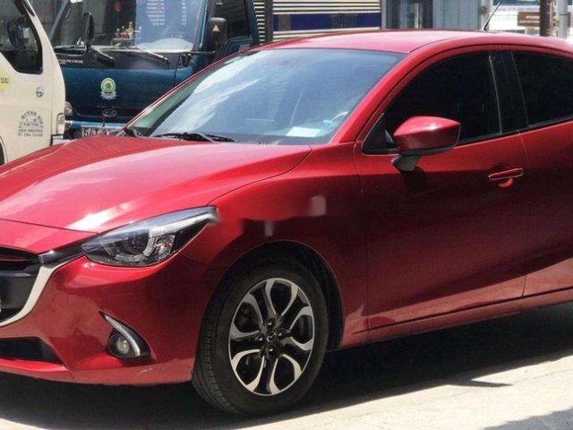 Bán xe Mazda 2 1.5AT đời 2016, màu đỏ 