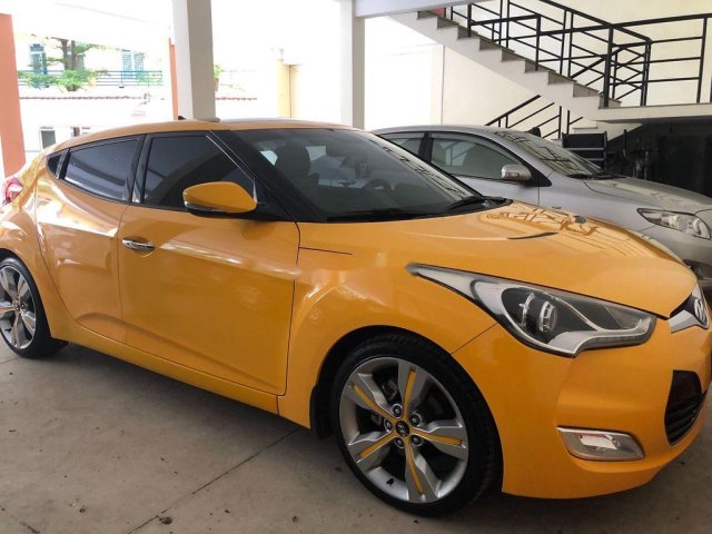 Gia đình bán Hyundai Veloster năm sản xuất 2011, màu vàng, xe nhập