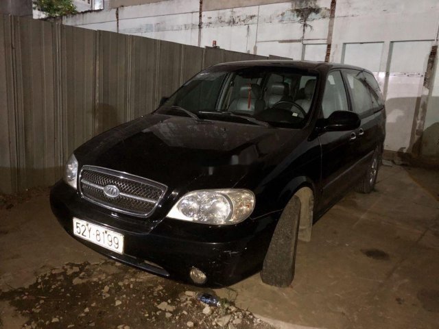 Cần bán xe Kia Carnival 2006, màu đen, giá 185tr