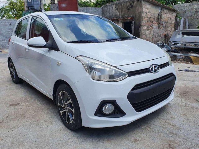 Bán xe Hyundai Grand i10 năm sản xuất 2014, màu trắng, nhập khẩu nguyên chiếc