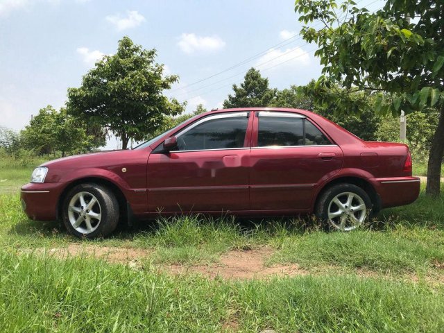 Cần bán lại xe Ford Laser đời 2002, màu đỏ 0