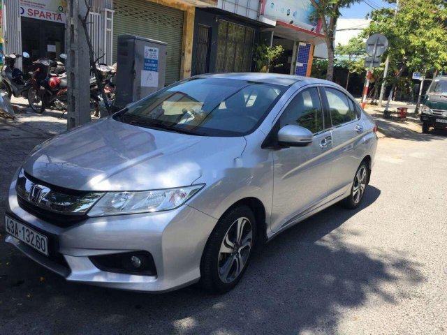 Cần bán xe Honda City đời 2014, màu bạc0