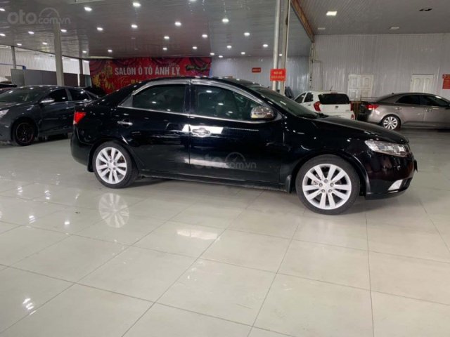 Cần bán xe Kia Forte 1.6MT năm 2012, màu đen số sàn giá cạnh tranh0