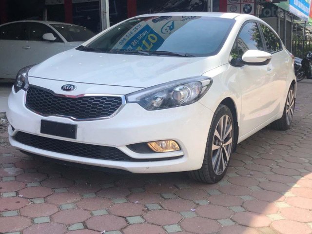 Bán Kia K3 1.6 AT đời 2015, màu trắng còn mới, giá chỉ 475 triệu