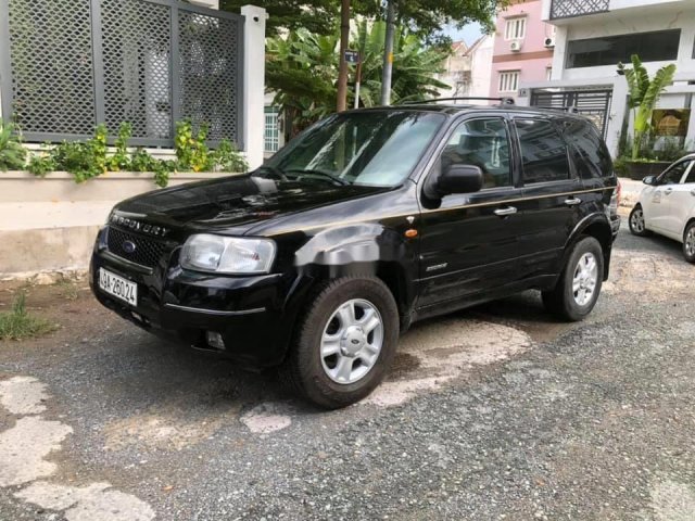 Chính chủ bán Ford Escape 2004, màu đen, bốn vỏ mới thay