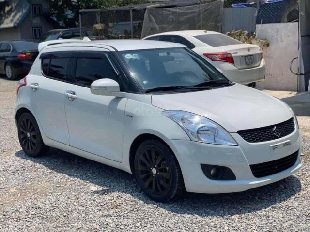 Cần bán lại xe Suzuki Swift 1.4 AT năm 2016, màu trắng 