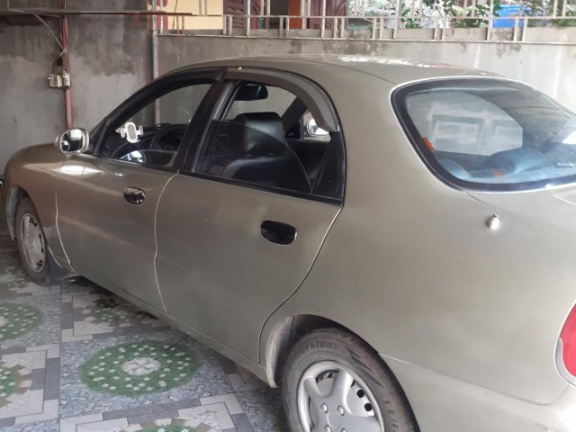 Cần bán Daewoo Lanos năm 2002, màu vàng mới 95% giá tốt 56 triệu đồng