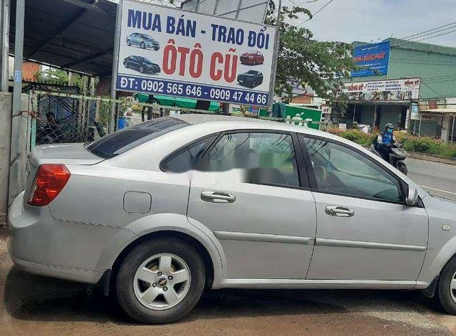 Cần bán Chevrolet Lacetti 2013, màu bạc, xe gia đình, 195 triệu