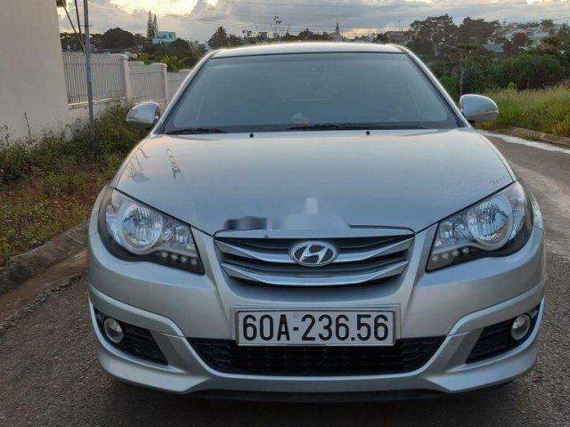 Chính chủ bán Hyundai Avante 1.6AT SX 2015, màu bạc0