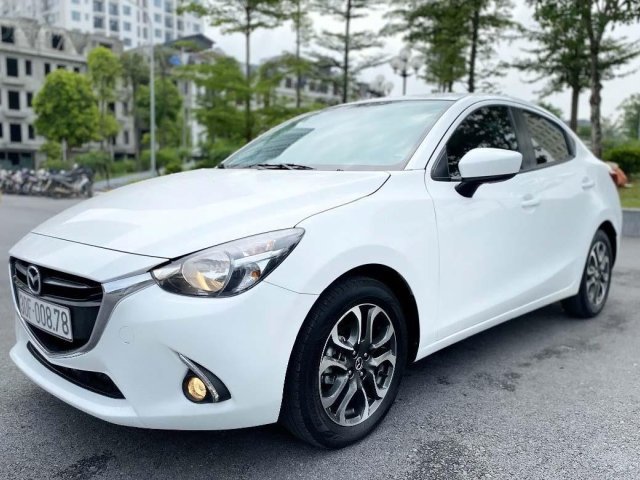 Cần bán xe Mazda 2 sản xuất 2017, màu trắng còn mới0
