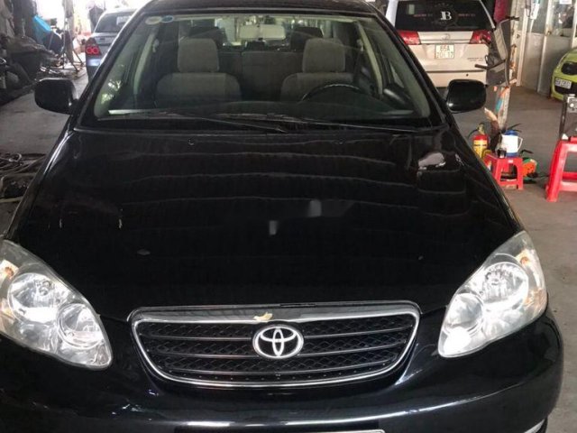 Cần bán xe Toyota Corolla Altis năm 2004, màu đen, giá 240tr