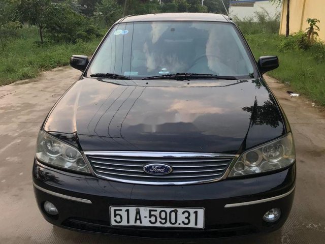 Bán ô tô Ford Laser 1.8 đời 2004, màu đen chính chủ