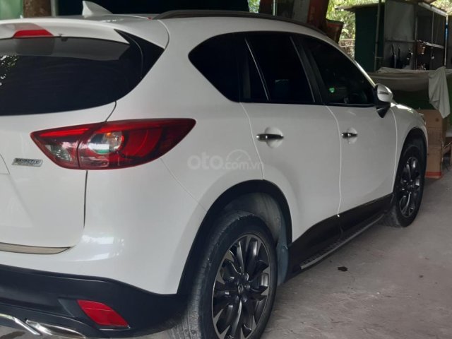 Cần bán gấp chiếc Mazda CX 5 đời 2017, màu trắng, xe chính chủ0