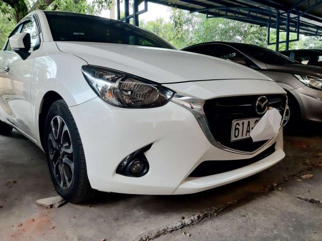 Bán xe Mazda 2 AT đời 2015, màu trắng, nhập khẩu nguyên chiếc  0