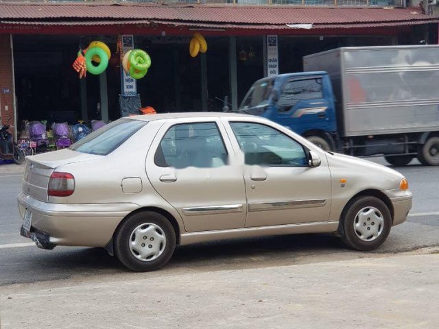 Bán xe Fiat Siena năm 2001, màu vàng cát0