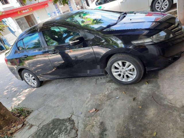 Bán xe Honda City đời 2014, màu đen còn mới