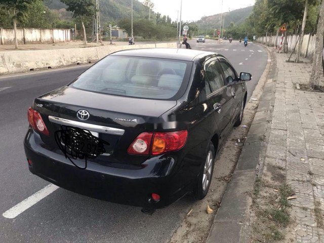 Cần bán gấp Toyota Corolla Altis năm sản xuất 2010, màu đen còn mới, giá chỉ 385 triệu0