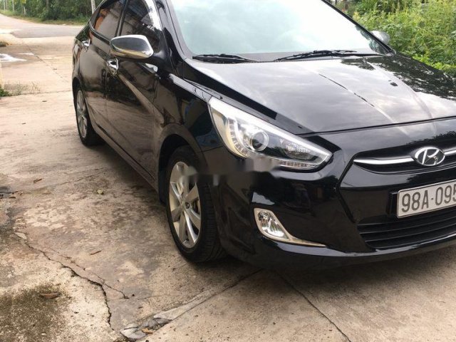 Bán xe Hyundai Accent năm 2016, màu đen, xe nhập số tự động0