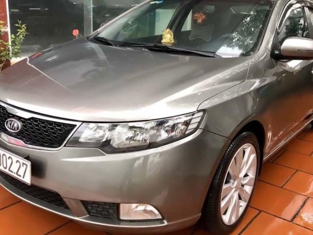 Cần bán lại Kia Forte EX 1.6 MT năm sản xuất 2011, màu xám, số sàn0